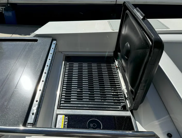 Aseage Yacht Photos Pics Outdoor grill on 2022 Formula 380 Super Sport Crossover OB boat deck.
