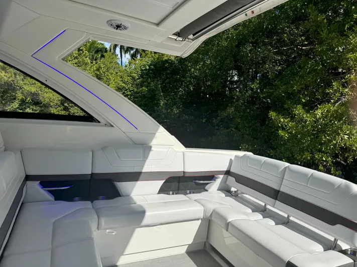 Aseage Yacht Photos Pics 2022 Formula 380 Super Sport Crossover OB interior with white seating and modern design.