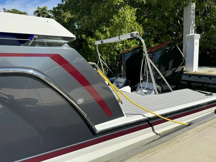 Aseage Yacht Photos Pics 2022 Formula 380 Super Sport Crossover OB docked, showcasing sleek design and modern features.