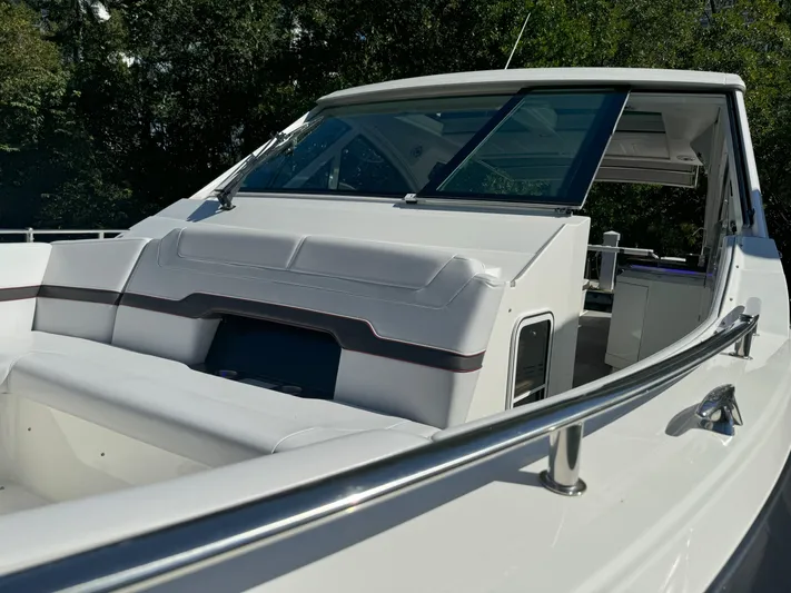 Aseage Yacht Photos Pics 2022 Formula 380 Super Sport Crossover OB boat with sleek design and spacious seating.