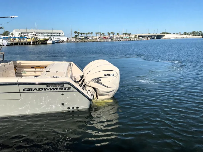  Yacht Photos Pics 2022 Grady-White 376 boat with Yamaha engine on calm water.