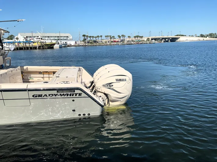  Yacht Photos Pics 2022 Grady-White 376 boat with Yamaha engine docked in a marina.