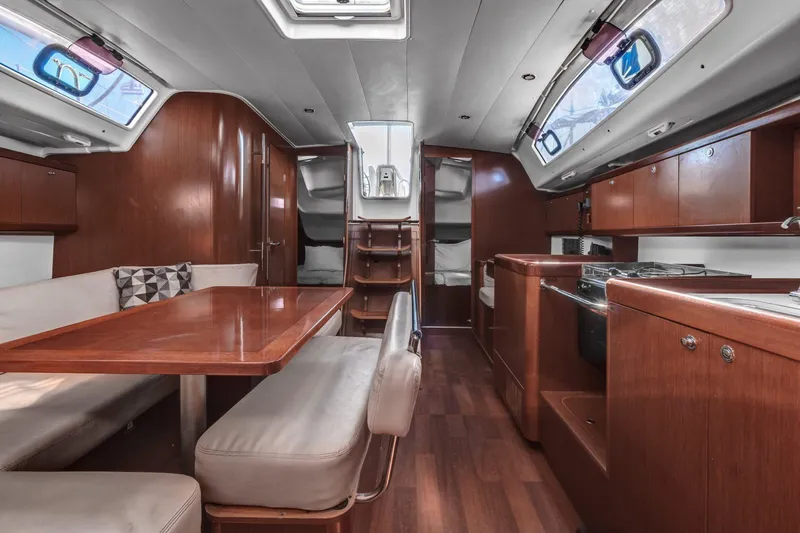 Pegasus Yacht Photos Pics Interior of 2011 Beneteau Oceanis 43 yacht with wood finish and modern amenities.