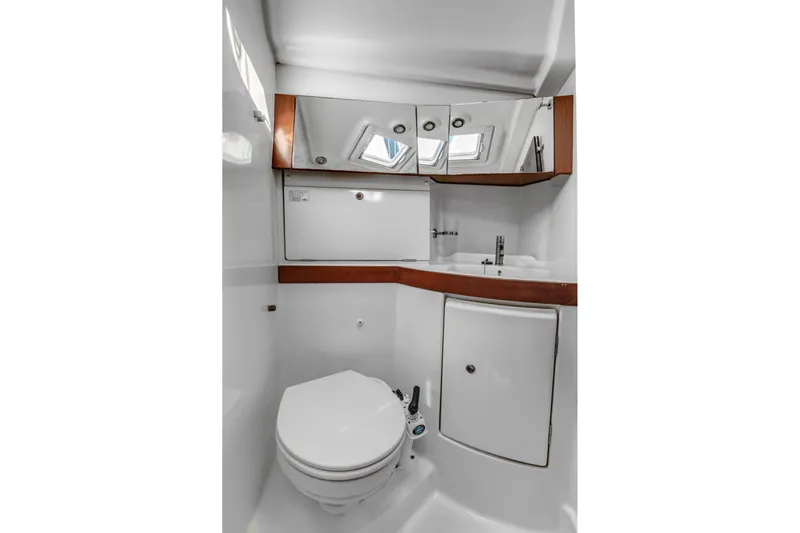 Pegasus Yacht Photos Pics Bathroom interior of 2011 Beneteau Oceanis 43 yacht, featuring modern fixtures and storage.