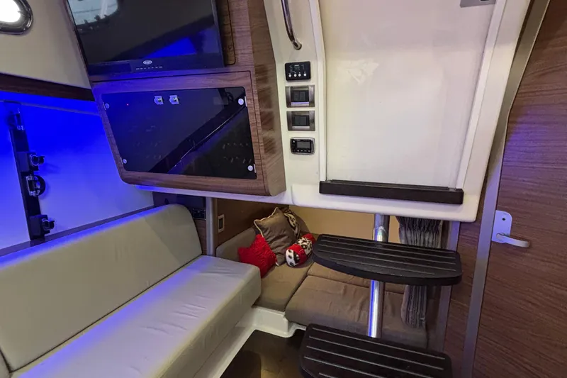 Whaler 345 Conquest - Loaded Yacht Photos Pics Interior of 2016 Boston Whaler 345 Conquest, featuring seating, steps, and ambient lighting.