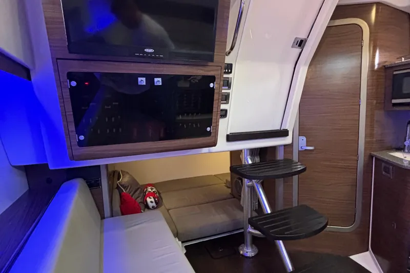 Whaler 345 Conquest - Loaded Yacht Photos Pics Interior of 2016 Boston Whaler 345 Conquest with modern amenities and cozy seating.