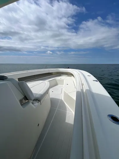  Yacht Photos Pics 2019 HCB Siesta boat on open water under a partly cloudy sky.