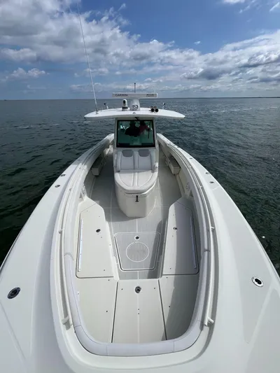  Yacht Photos Pics 2019 HCB Siesta boat on open water under a partly cloudy sky.