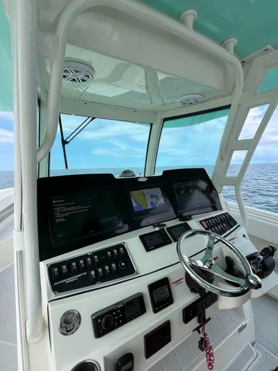  Yacht Photos Pics 2019 HCB Siesta boat helm with advanced navigation system and ocean view.