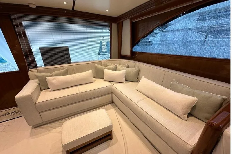 Spey Yacht Photos Pics Luxurious interior of 2010 Viking 57 Convertible yacht with plush beige seating.