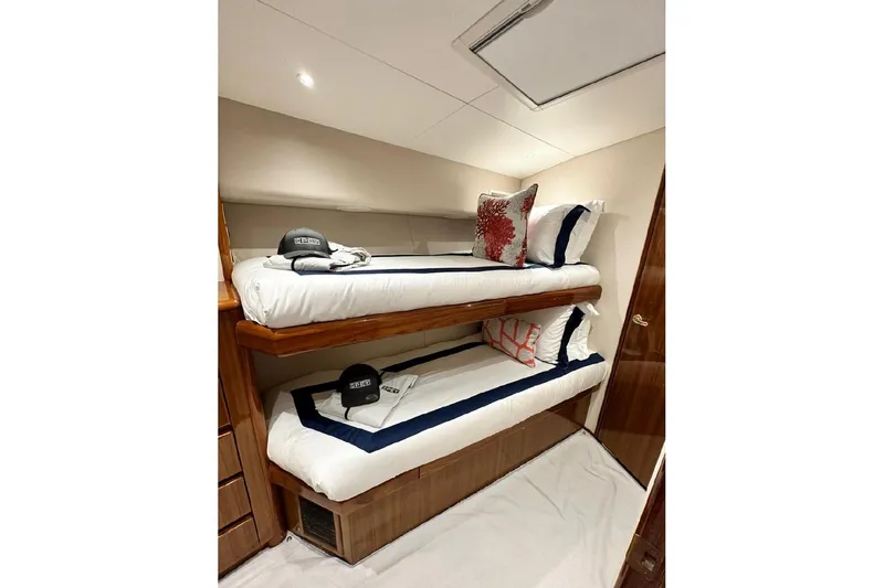 Spey Yacht Photos Pics Bunk beds in 2010 Viking 57 Convertible yacht cabin with nautical decor.