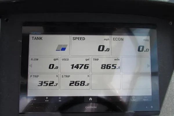 317-147 Brokerage Ray Yacht Photos Pics Garmin display on 2018 Robalo R317 Dual Console showing fuel and trip data.