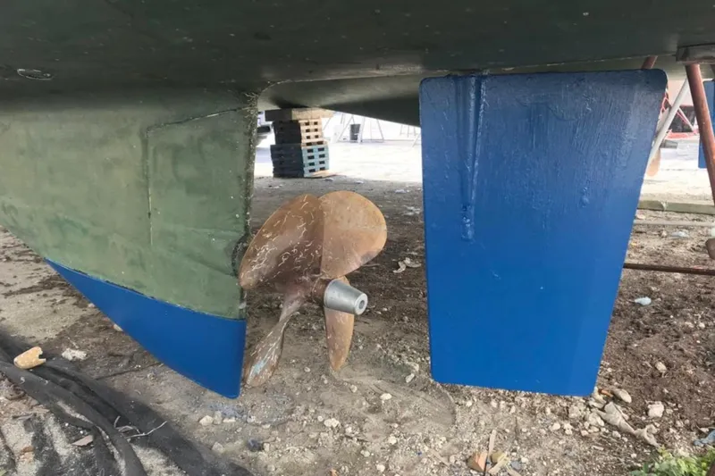 Mangata Yacht Photos Pics 2003 Lagoon Power 43 boat propeller and rudder, dry docked for maintenance.