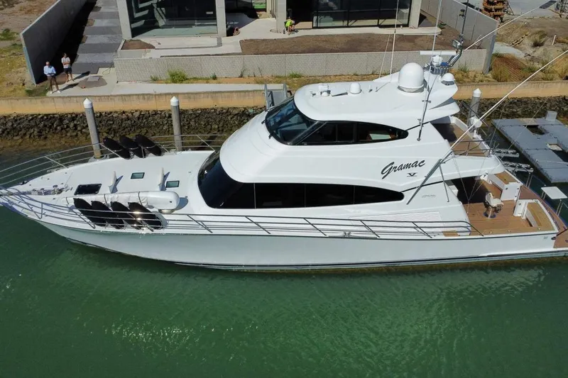 Gramac V Yacht Photos Pics Luxury 2007 Azzura 76 yacht docked at marina, aerial view.