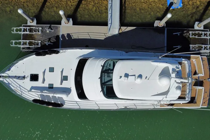 Gramac V Yacht Photos Pics Aerial view of 2007 Azzura 76 yacht docked at a marina.