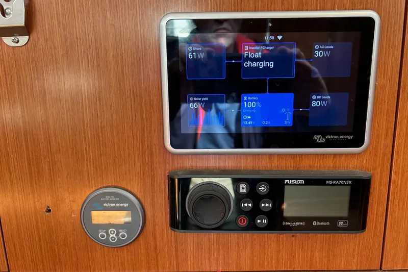 Banyan Sea Yacht Photos Pics Control panel of a 2008 Beneteau Oceanis 43 sailboat with Victron Energy display.