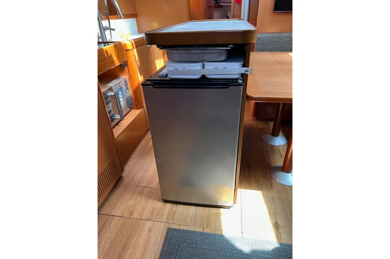 Banyan Sea Yacht Photos Pics Compact refrigerator in the galley of a 2008 Beneteau Oceanis 43 sailboat.