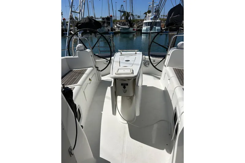 Banyan Sea Yacht Photos Pics Cockpit view of 2008 Beneteau Oceanis 43 sailboat in marina setting.