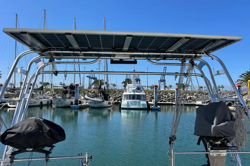 Banyan Sea Yacht Photos Pics Beneteau Oceanis 43 sailboat with solar panels docked in a marina, 2008 model.