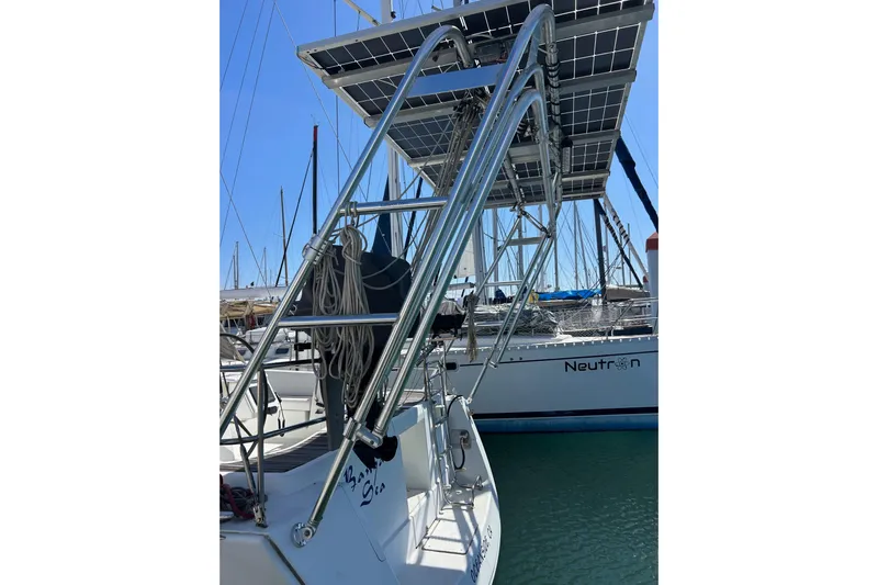 Banyan Sea Yacht Photos Pics Beneteau Oceanis 43 sailboat with solar panels, docked in a marina, 2008 model.