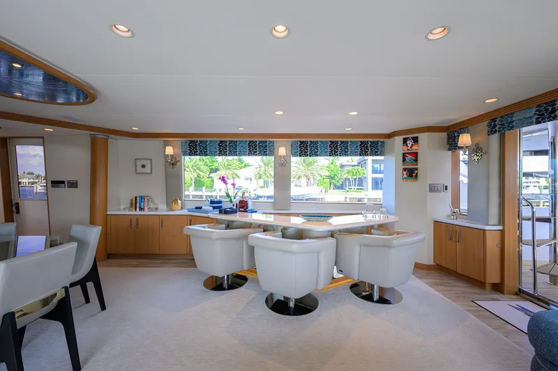 Hard Times Yacht Photos Pics Luxurious interior of 1998 Westport Westbay Sonship yacht with elegant seating and large windows.