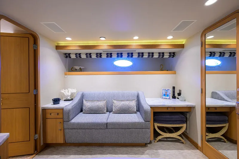 Hard Times Yacht Photos Pics Luxurious 1998 Westport Westbay Sonship yacht interior with cozy seating and elegant decor.