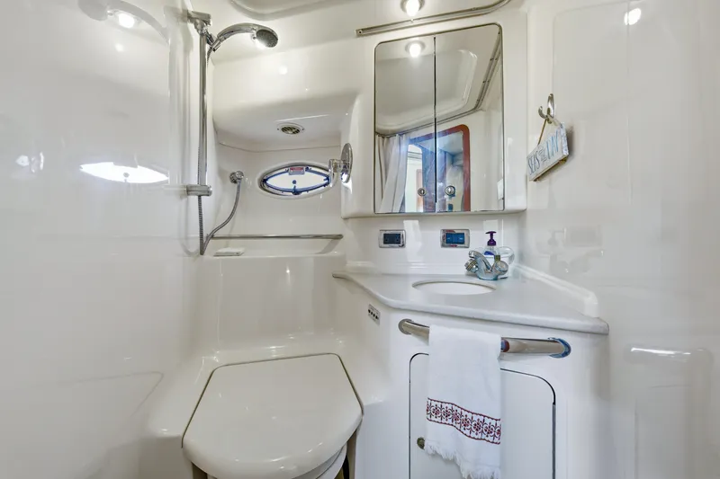 Life Is Good Yacht Photos Pics Luxurious bathroom in 2002 Sea Ray 460 Sundancer yacht with shower and vanity.