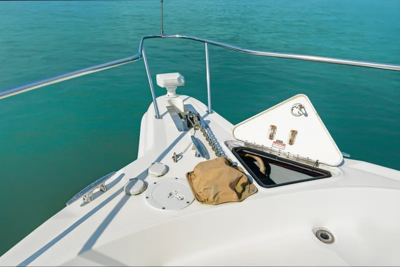 Life Is Good Yacht Photos Pics Bow of 2002 Sea Ray 460 Sundancer yacht with anchor and open hatch.