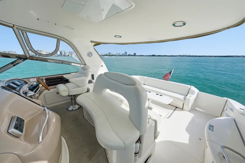 Life Is Good Yacht Photos Pics Luxurious 2002 Sea Ray 460 Sundancer yacht interior with ocean view and American flag.