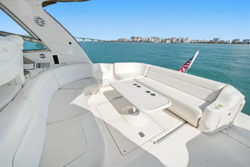 Life Is Good Yacht Photos Pics Luxurious 2002 Sea Ray 460 Sundancer yacht interior with ocean view and city skyline.