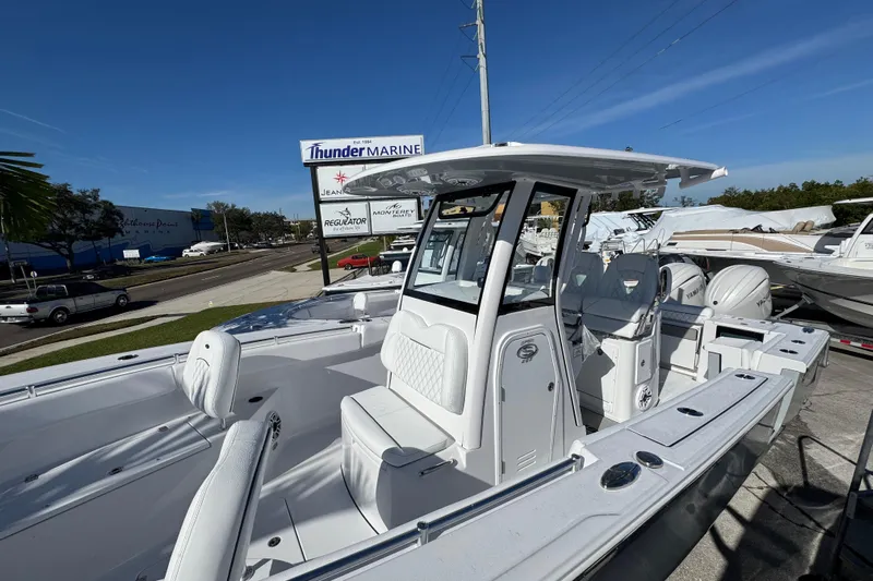  Yacht Photos Pics 2026 Sportsman Open 262 Center Console boat displayed at Thunder Marine dealership.