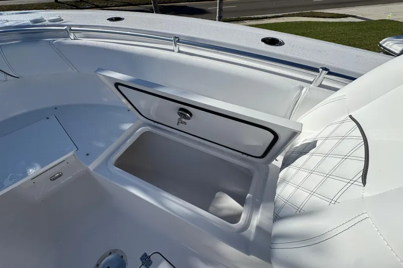  Yacht Photos Pics 2026 Sportsman Open 262 Center Console boat with open storage compartment.
