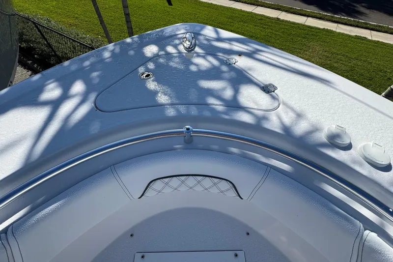  Yacht Photos Pics 2026 Sportsman Open 262 Center Console boat deck with sleek design and stainless steel railing.