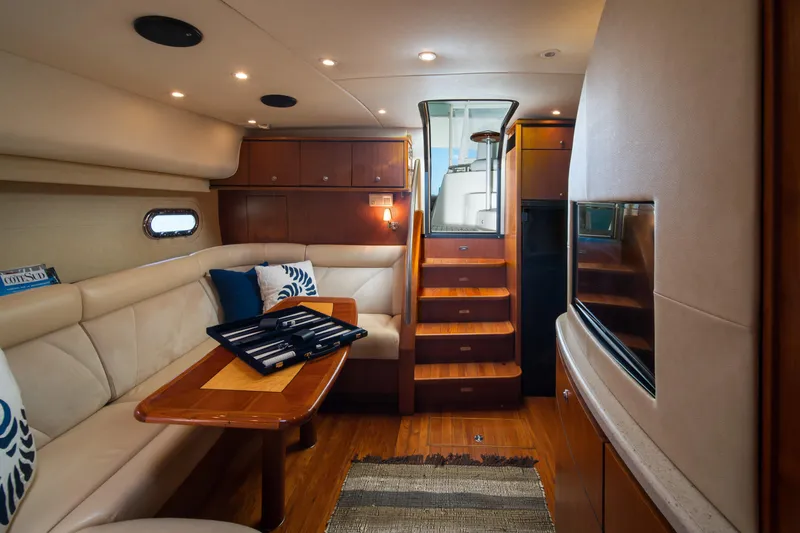  Yacht Photos Pics Luxurious interior of 2007 Tiara Yachts 4300 Sovran with elegant seating and wooden finishes.