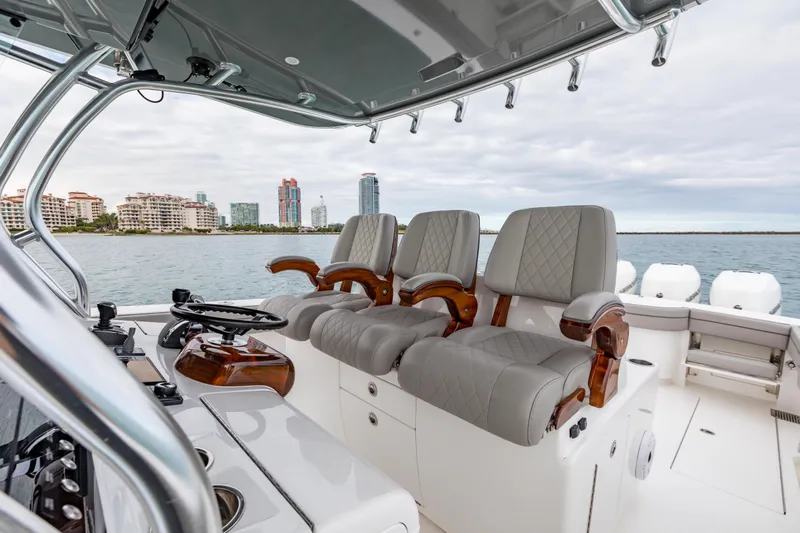 Bank Fees Yacht Photos Pics 2022 Valhalla Boatworks V-41 interior with luxury seating and ocean view.