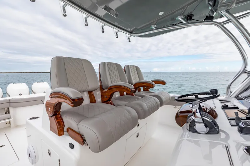 Bank Fees Yacht Photos Pics Luxurious 2022 Valhalla Boatworks V-41 helm seats with ocean view.