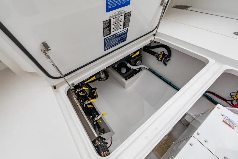 Bank Fees Yacht Photos Pics 2022 Valhalla Boatworks V-41 engine compartment with detailed mechanical components.