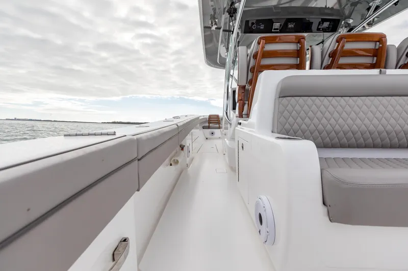 Bank Fees Yacht Photos Pics 2022 Valhalla Boatworks V-41 interior with luxurious seating and sleek design on open water.