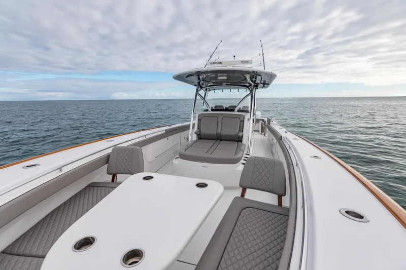 Bank Fees Yacht Photos Pics 2022 Valhalla Boatworks V-41 on open water, featuring spacious seating and sleek design.