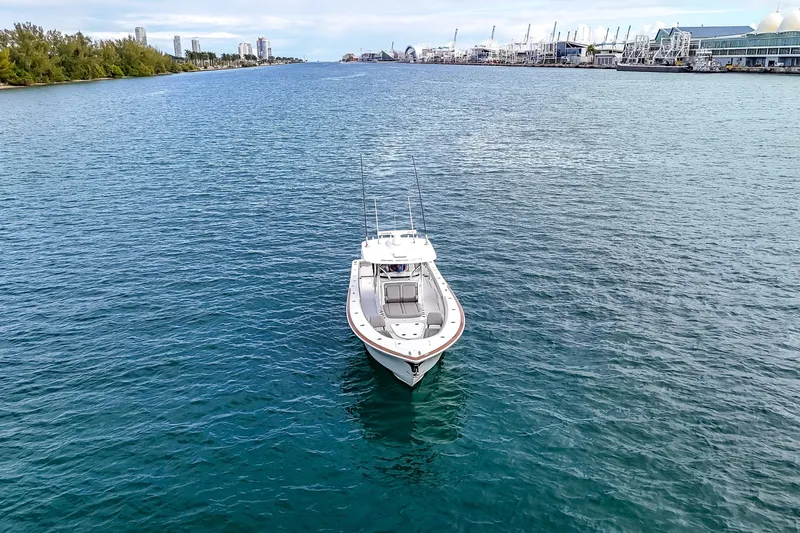 Bank Fees Yacht Photos Pics 2022 Valhalla Boatworks V-41 cruising in a scenic harbor setting.