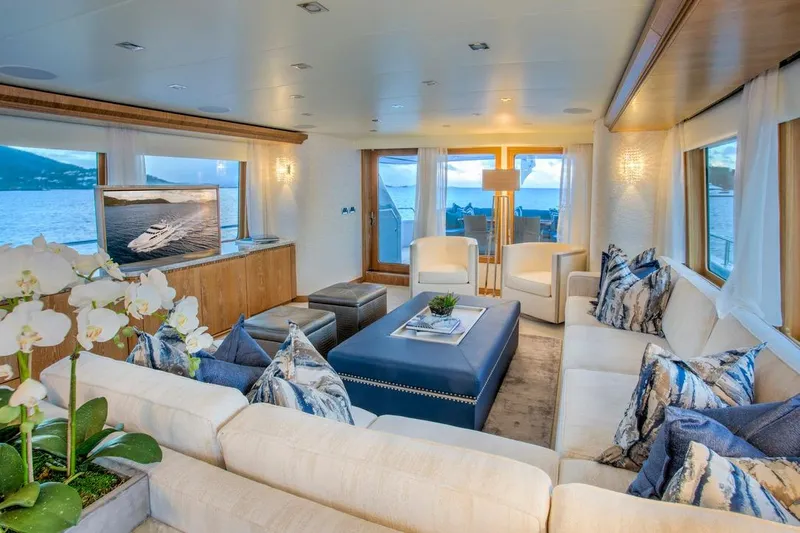  Yacht Photos Pics Luxurious 1994 Broward Marine Raised Pilothouse yacht interior with elegant seating and ocean views.