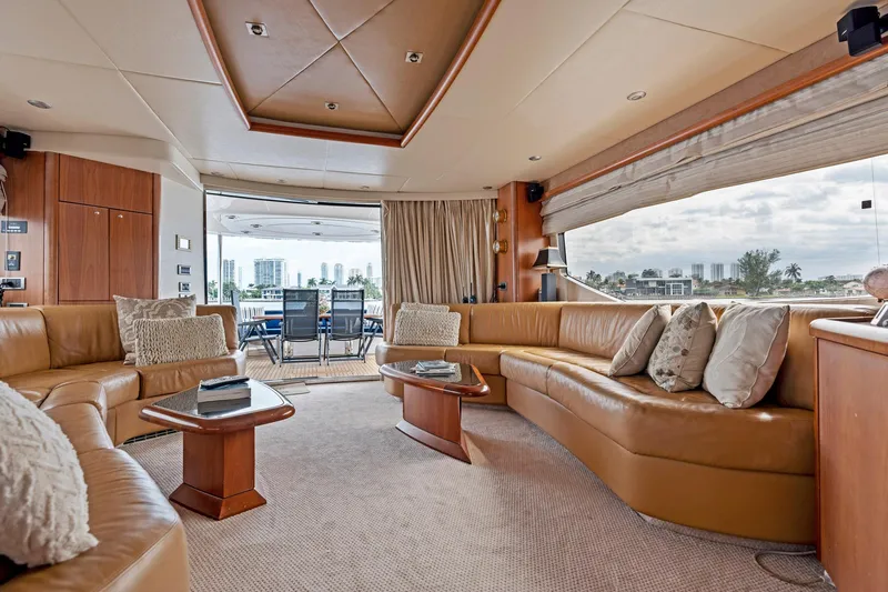 Persistence Yacht Photos Pics Luxurious interior of 2006 Sunseeker 75 Yacht with plush seating and scenic views.