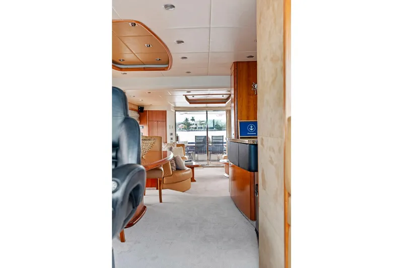 Persistence Yacht Photos Pics Interior view of a 2006 Sunseeker 75 Yacht, featuring luxurious seating and elegant design.