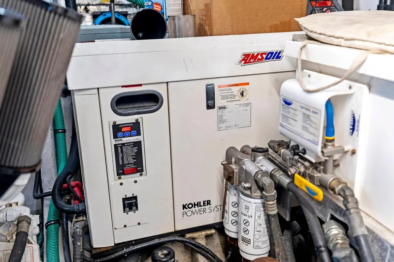 Persistence Yacht Photos Pics Engine room of a 2006 Sunseeker 75 Yacht featuring Kohler power system.