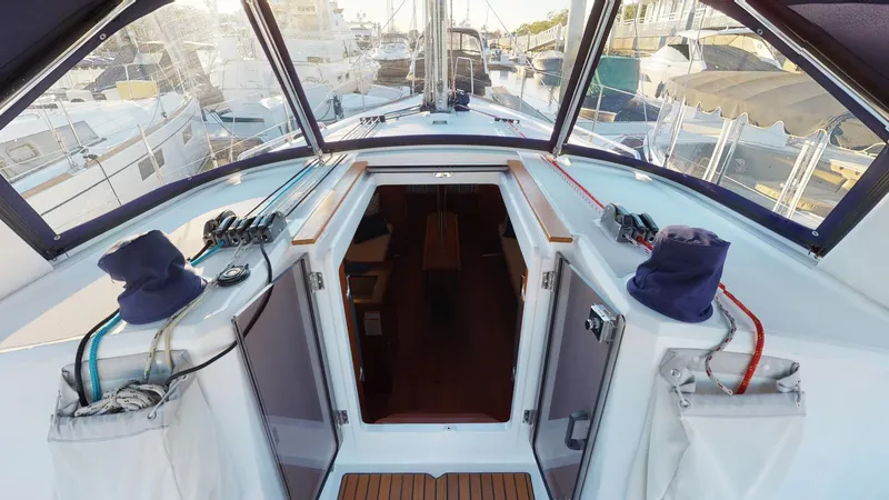Wanderlust Yacht Photos Pics 2019 Beneteau Oceanis 38.1 yacht cockpit with open cabin entrance.