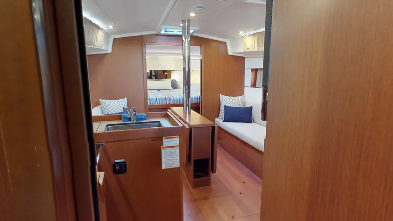 Wanderlust Yacht Photos Pics Interior of 2019 Beneteau Oceanis 38.1 yacht, featuring cozy seating and modern design.