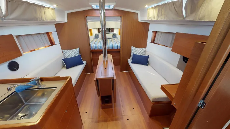 Wanderlust Yacht Photos Pics Interior of 2019 Beneteau Oceanis 38.1 yacht, featuring cozy seating and modern design.