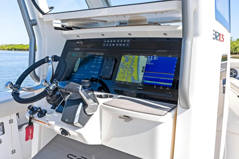  Yacht Photos Pics 2025 Solace 32 CS boat dashboard with advanced navigation and control systems.