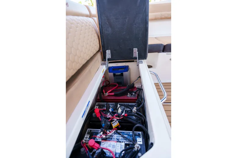  Yacht Photos Pics Sea Ray boat battery compartment with multiple batteries and wiring.