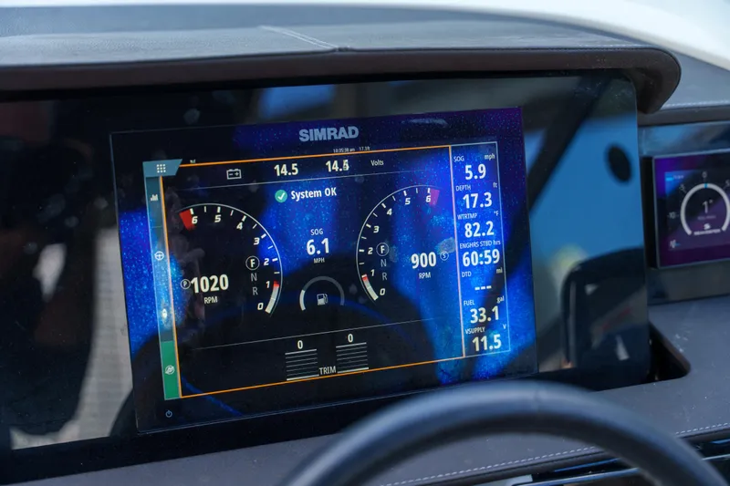  Yacht Photos Pics Simrad marine display on Sea Ray boat showing engine and navigation data.